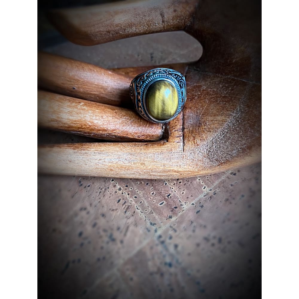 Viking Mammen Pearl ring displayed on a wooden surface